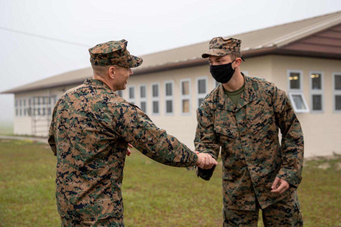 coin handshake, what is a challenge coin, coins of excellence, unit coins, usmc challenge coins, marine corps coins,
